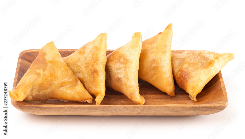 Vegetable Samosas on a White Background Vegetable Samosas on a White Background