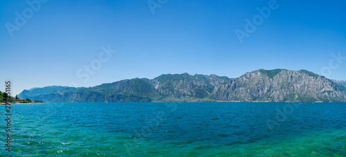 Fototapeta Naklejka Na Ścianę i Meble -  Beautiful panoramic view of Lake Garda, Italy. View of Limone Sul Garda resort city, Italy
