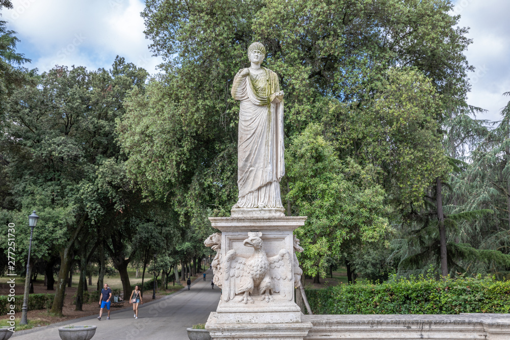 Art sculpture in green garden of Villa Borghese