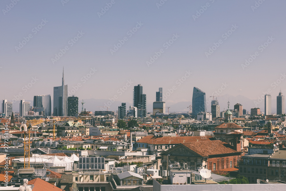 Panoramic view of Milan city with modern buildings from Milan Cathedral