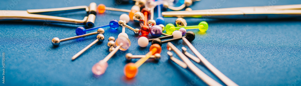 Body piercing background jewelry rings puncturing implants | Blurry Background Body piercing background jewelry rings puncturing implants | Blurry Background