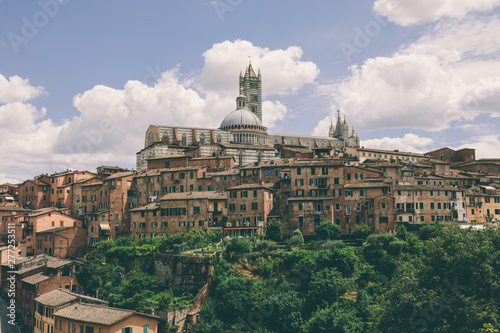 Panoramic view of Siena city with historic buildings and street © TravelFlow