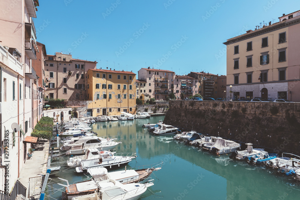 Panoramic view of historic buildings of Lovorno with water canal