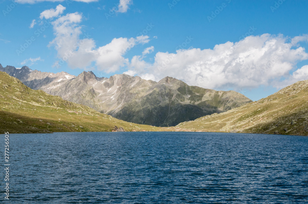 View closeup Marjelen lakes, scene in mountains, route great Aletsch Glacier