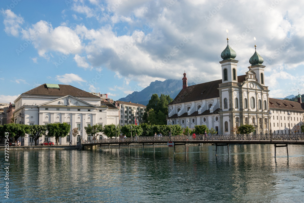 Fototapeta premium Panoramic view of Lucerne city with Jesuit Church and river Reuss