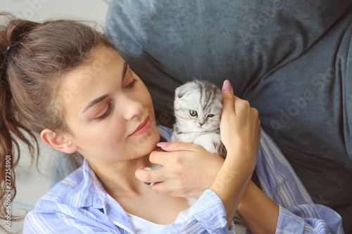 Beautiful young woman with ...