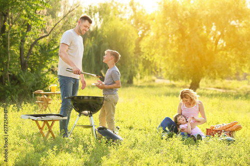 Happy family on summer picn...