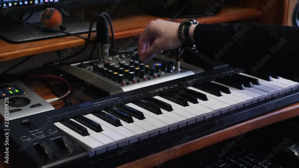 Sound engineer work station with soundboard midi piano and sound