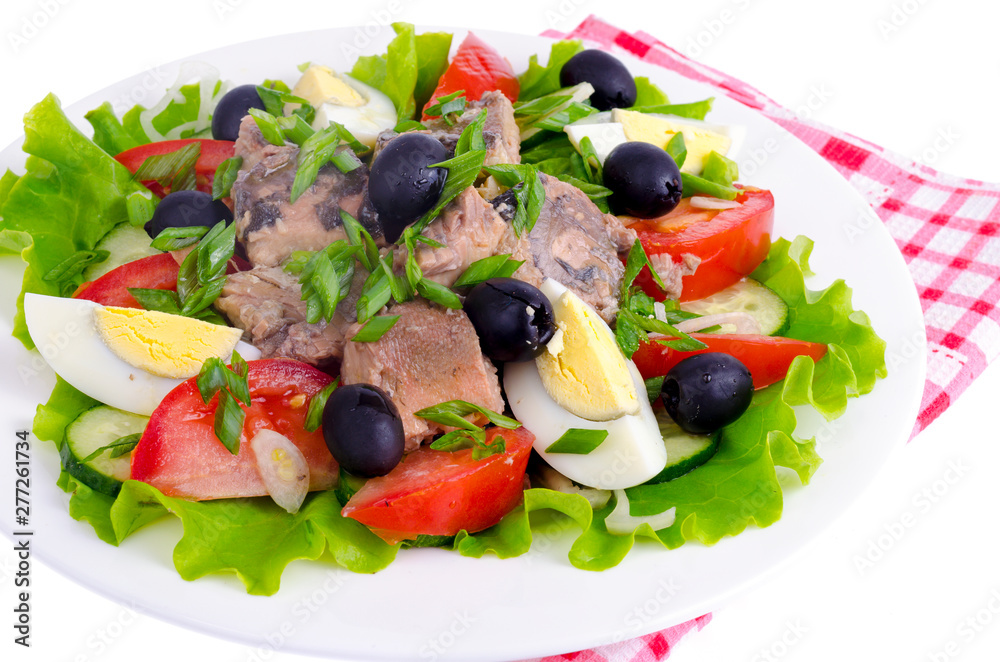 Salad of fresh vegetables, egg, canned fish and olives. Salad of fresh vegetables, egg, canned fish and olives.