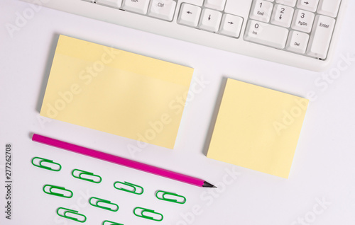 Flat lay above blank copy space sticky notes with business concept. Blank papers for text messages.