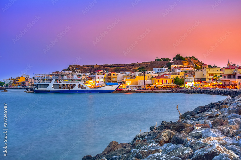 High night view of traditional village of Paleochora at sunset, Chania, Crete, Greece.
