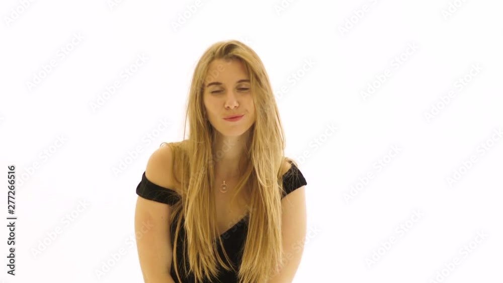 Young woman have fun on white background in the studio Young woman have fun on white background in the studio