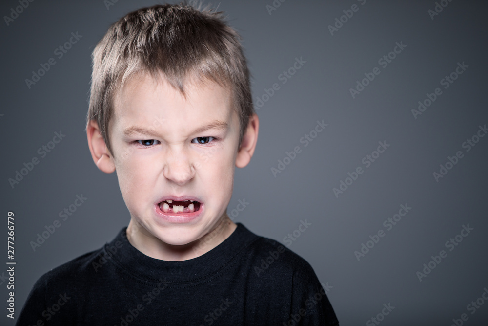 Loads of aggression in a little boy education concept hinting