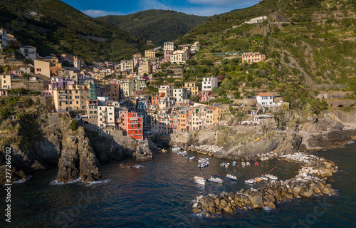 Riomaggiore of Cinque Terre, Italy - Traditional fishing village in La Spezia, situate in coastline of Liguria of Italy. Riomaggiore is one of the five Cinque Terre travel attractions.