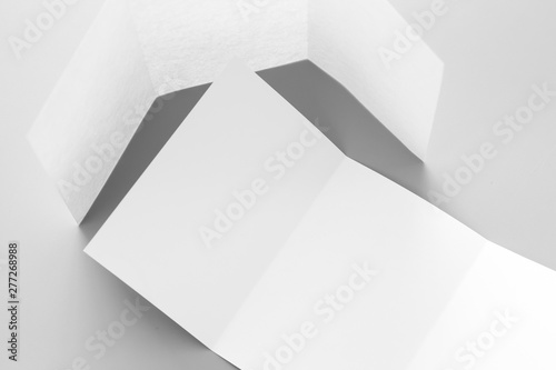 Wallpaper Mural Blank portrait mock-up paper. brochure magazine isolated on gray, changeable background / white paper isolated on gray Torontodigital.ca