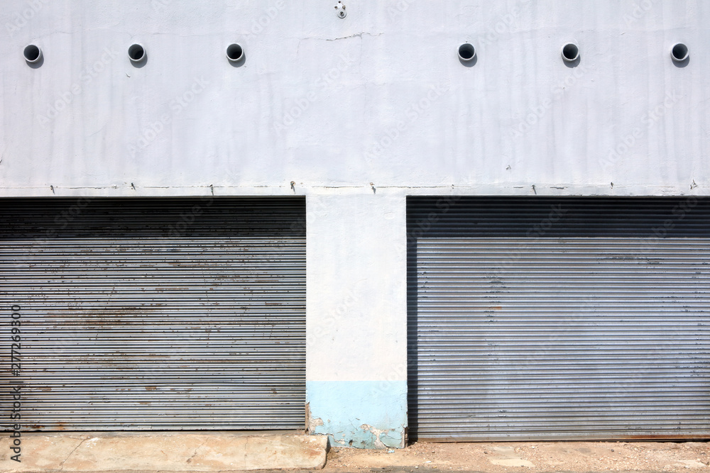 Fototapeta premium exterior view of close up warehouse roller doors