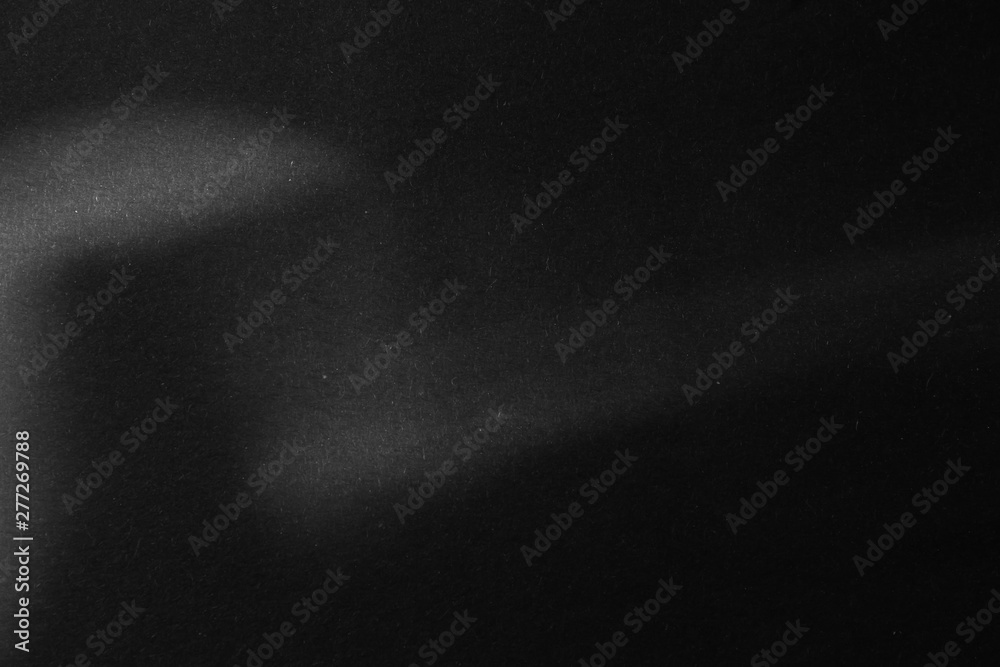 black paper texture or background with spotlight, dark wall backdrop wallpaper, dark tone. black paper texture or background with spotlight, dark wall backdrop wallpaper, dark tone.