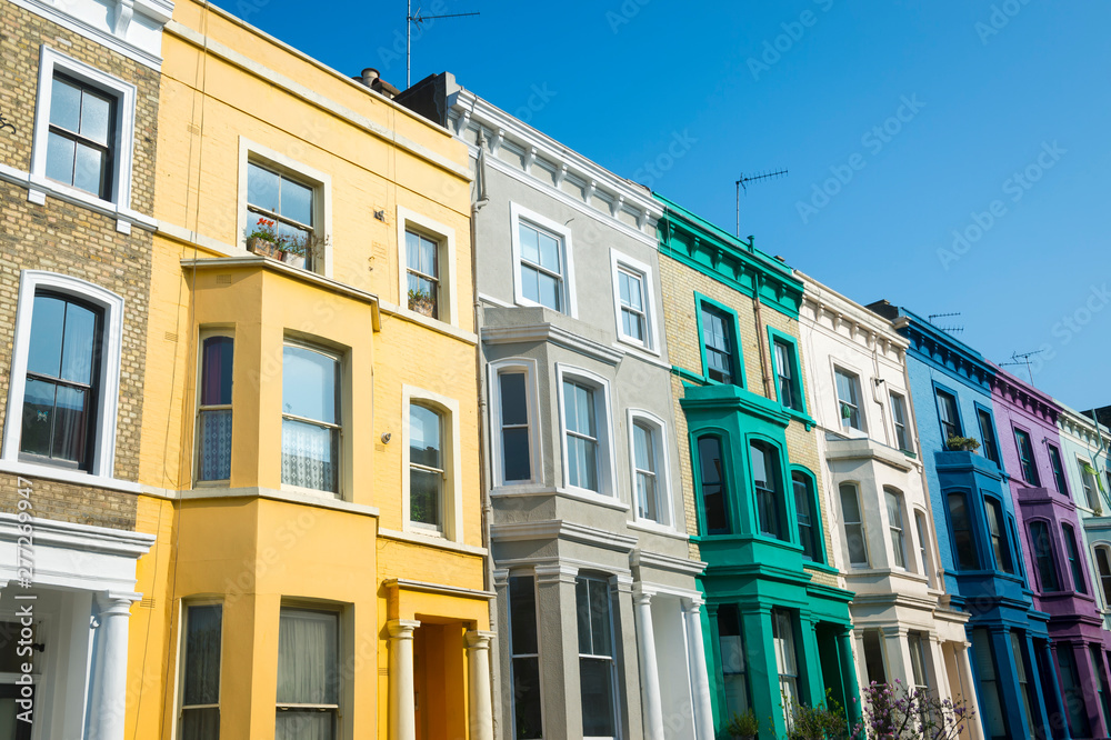 Fototapeta premium Traditional colorful row houses in the Notting Hill neighborhood of London, England, UK