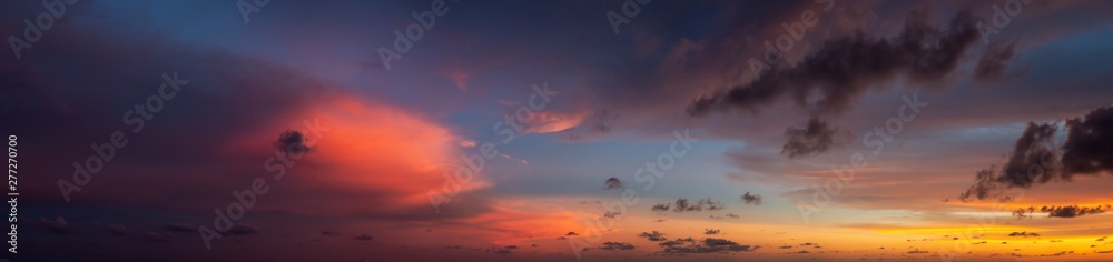 Dramatic Panoramic View of a cloudscape during a cloudy and colorful sunset. Taken over Beach Ancon in Trinidad, Cuba.