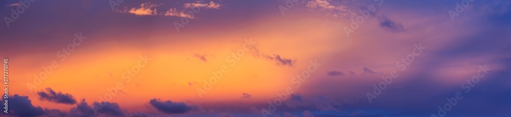 Dramatic Panoramic View of a cloudscape during a cloudy and colorful sunset. Taken over Beach Ancon in Trinidad, Cuba.