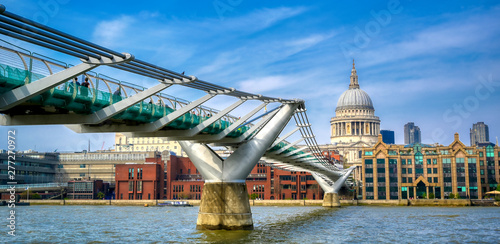Obraz na płótnie London, United Kingdom - April 18, 2019 - St. Paul's Cathedral across Millennium Bridge and the River Thames in London, UK. w salonie