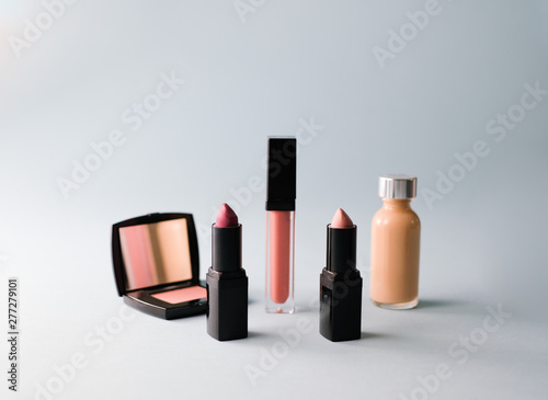 Beauty background makeup cosmetic product   on purple spring background. woman mother day concept. flatlay topview © paulynn