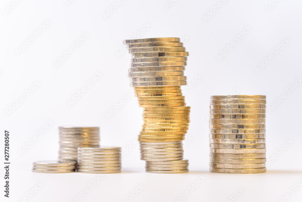 Coins stacked on white background concept about business, finance, banking and investment. Coins stacked on white background concept about business, finance, banking and investment.