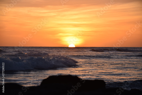 Tropical glowing orange Hawaiian sunset