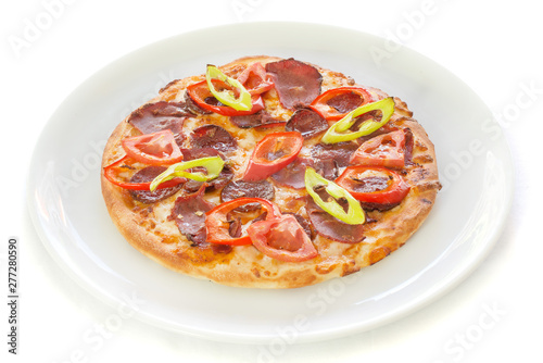 Delicious, tasty, fresh and italian pepperoni or margherita pizza isolated on white. View of mixed pizza in restaurant at napoli. Pizza on plate from top view.