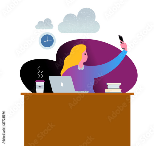 Girl taking selfie at the office.