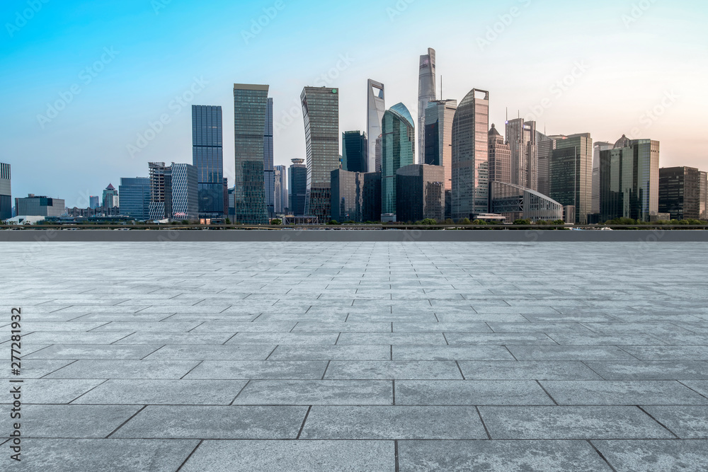 Urban skyscrapers with empty square floor tiles Urban skyscrapers with empty square floor tiles