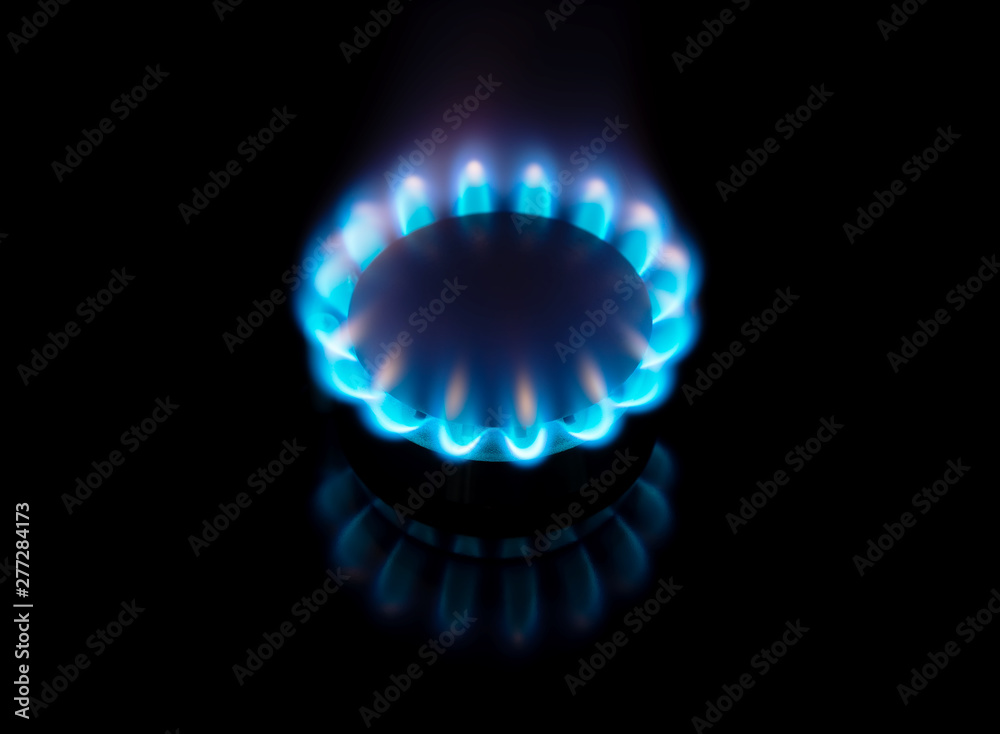 Gas stove burner on black background Gas stove burner on black background