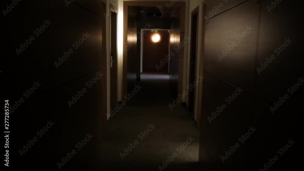 The POV of walking in empty hotel corridors.