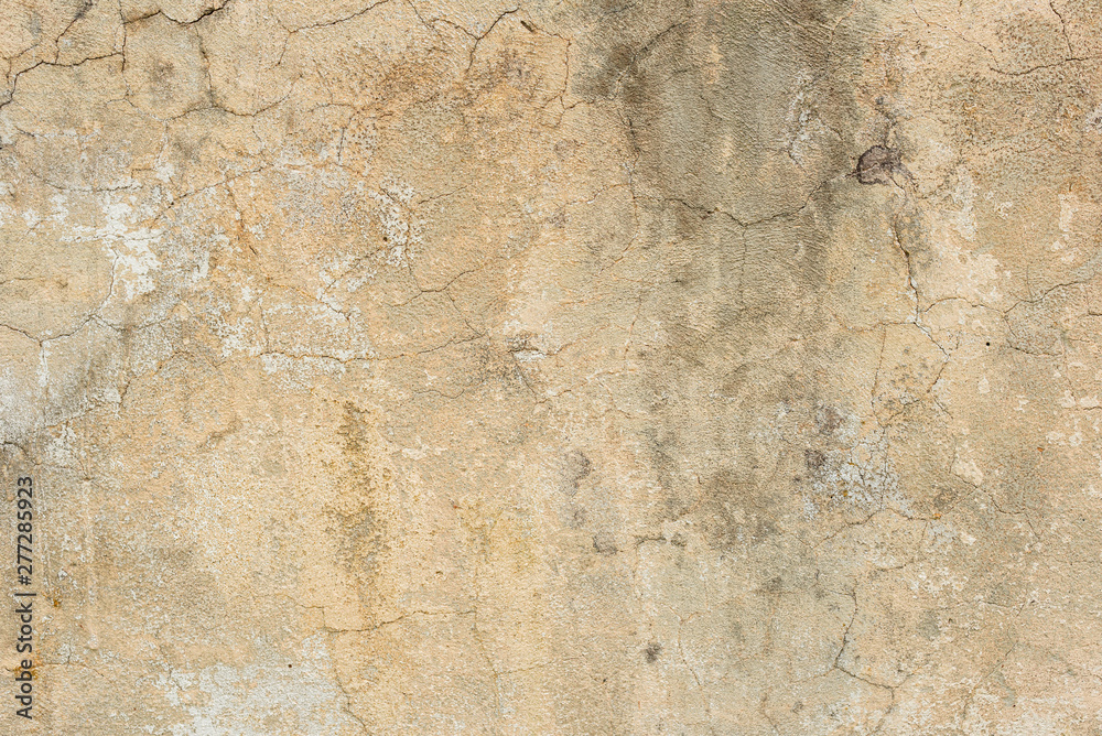 Fototapeta premium Texture of a concrete wall with cracks and scratches which can be used as a background