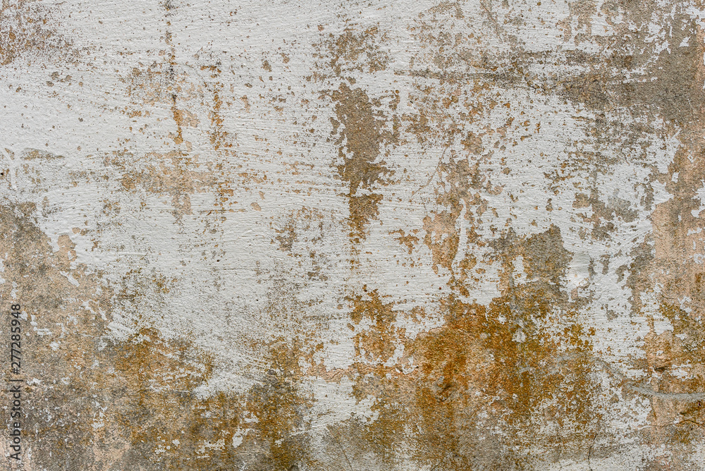 Texture of a concrete wall with cracks and scratches which can be used as a background Texture of a concrete wall with cracks and scratches which can be used as a background