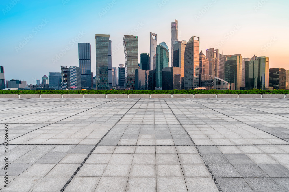 Urban skyscrapers with empty square floor tiles