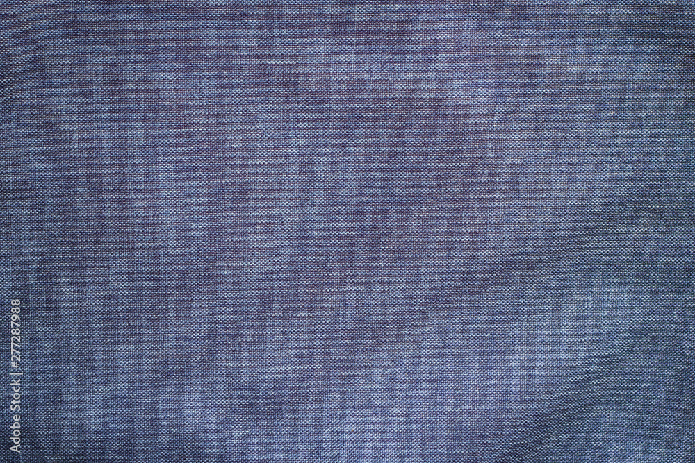 Leather label on denim clothing. Detail of Blue Jeans denim texture. The concept of Fashion jeans. Leather label on denim clothing. Detail of Blue Jeans denim texture. The concept of Fashion jeans.
