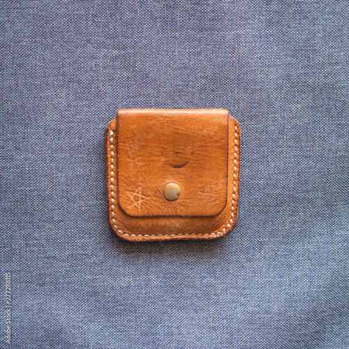 Leather label on denim clothing. Detail of Blue Jeans denim texture. The concept of Fashion jeans. 