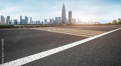 Road and skyline of urban architecture..