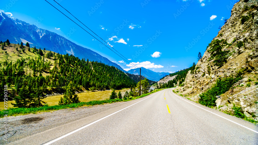 Naklejka premium Highway 12, the in some areas dangerous Lytton-Lillooet Highway, follows the Fraser River for a scenic drive along precipitous areas of the east bank of the Fraser River in British Columbia, Canada