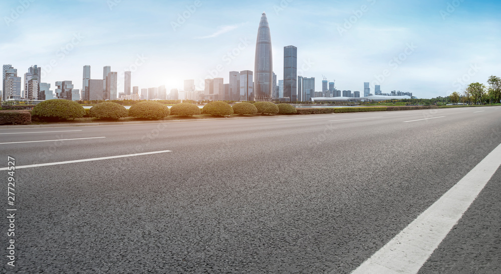 Road and skyline of urban architecture..