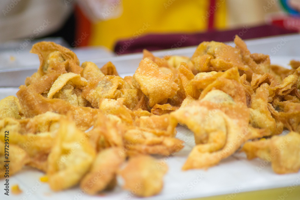 close up of cryspy fried wonton close up of cryspy fried wonton