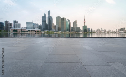 Urban skyscrapers with empty square floor tiles