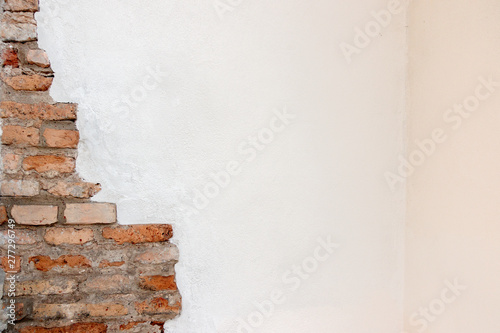 Fotografie White plaster with old vintage red brick wall banner background