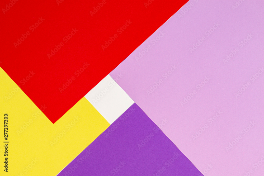 Color papers geometry flat composition background with violet, purple, pink, red, yellow tones.