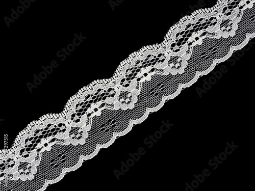 White lace on black background © zah108