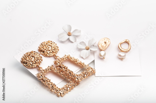 set of bright earrings isolated on white background