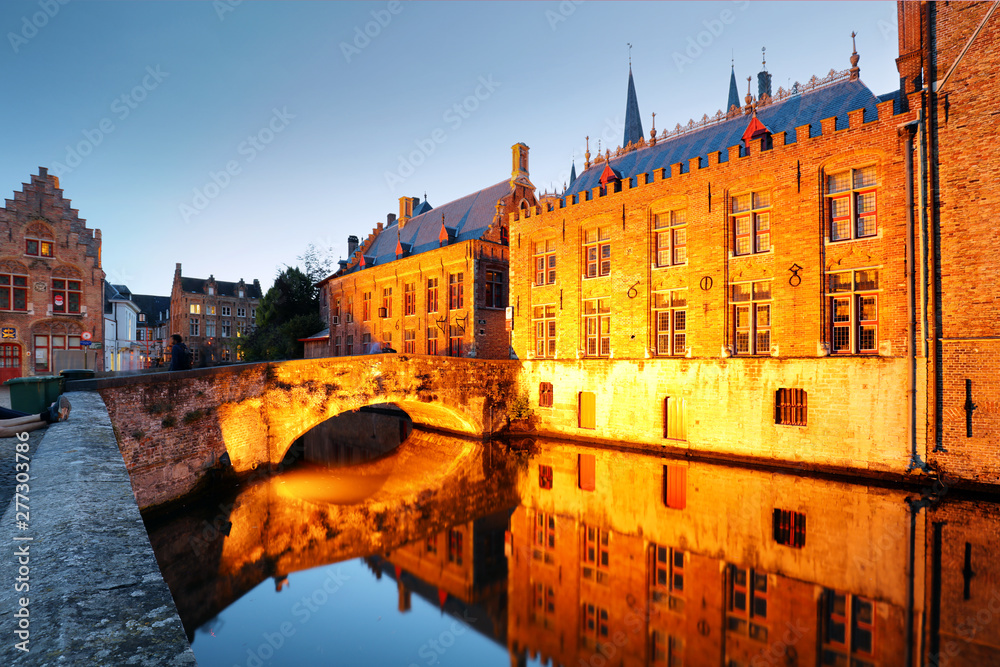 Belgium - Historical centre of  Bruges river view. Old Brugge buildings reflecting in water canal.