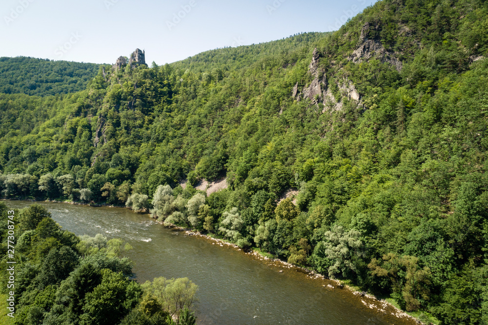Aerial view of ruins of the Old Strecno castle (Starhrad) and Vah river, Slovak republic