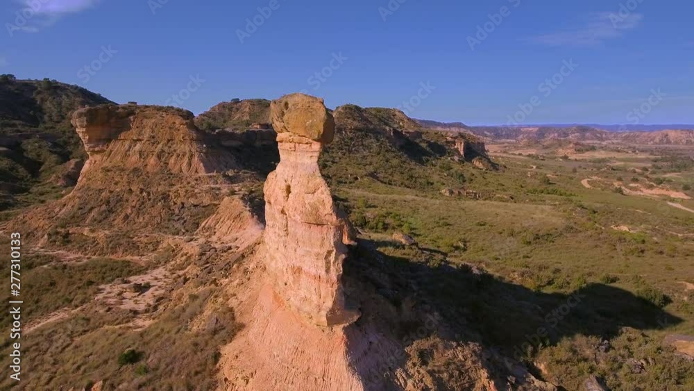 Soft flight around a cliff in a desert environment